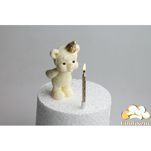 Chocolate figurine "Bear blowing out a candle"